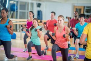 Affordable gym membership for students enjoying group fitness classes at PSB Fitness